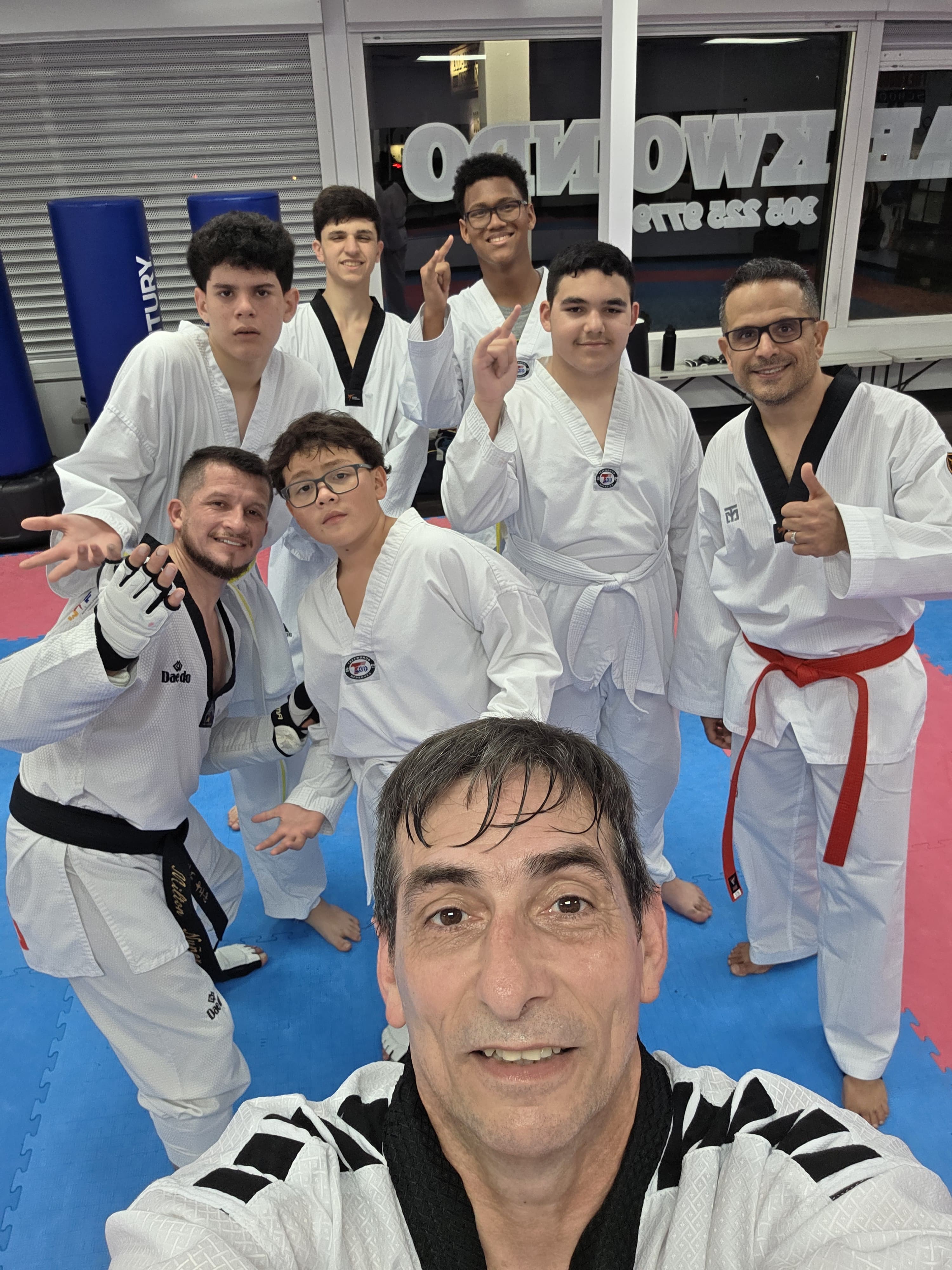 Black Belt Team group photo with Master Vicente at the school